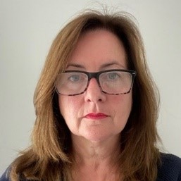 A photograph of Caroline Corrigan, Chief People Officer of NHS Frimley